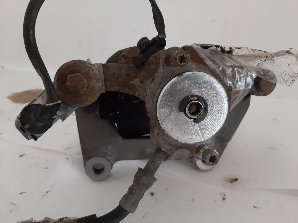 Гальмівний супорт лівий задній Audi A6 C7 A7 3.0 TDI 2015 рр 4G0615403